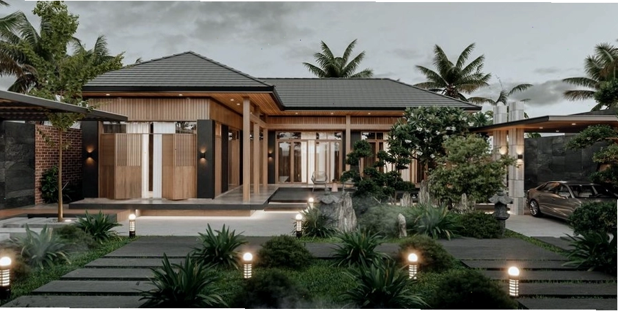 Lối đi trong sân vườn được thiết kế tinh tế với đá và cây xanh