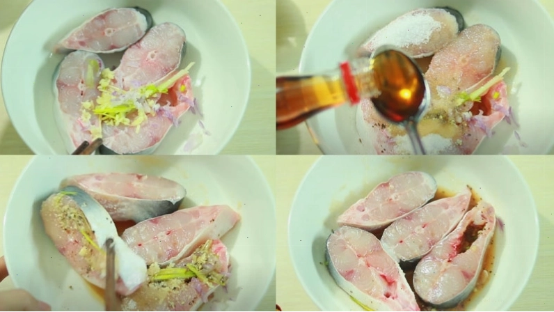 Ướp cá basa với gia vị trước khi kho